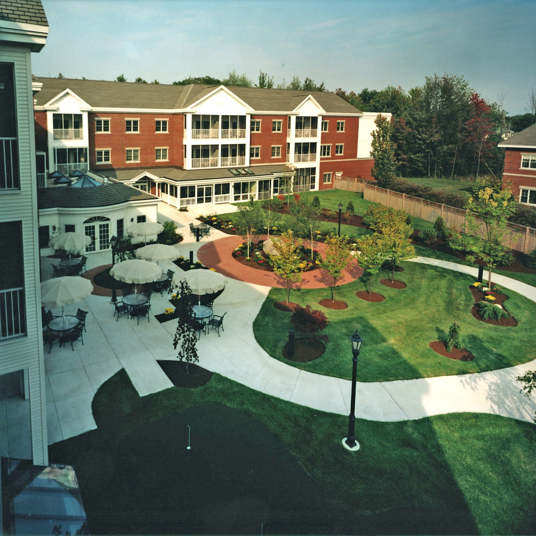 LANDSCAPED COURTYARD SHOWING POOL PAVILION & PUTTING GREEN