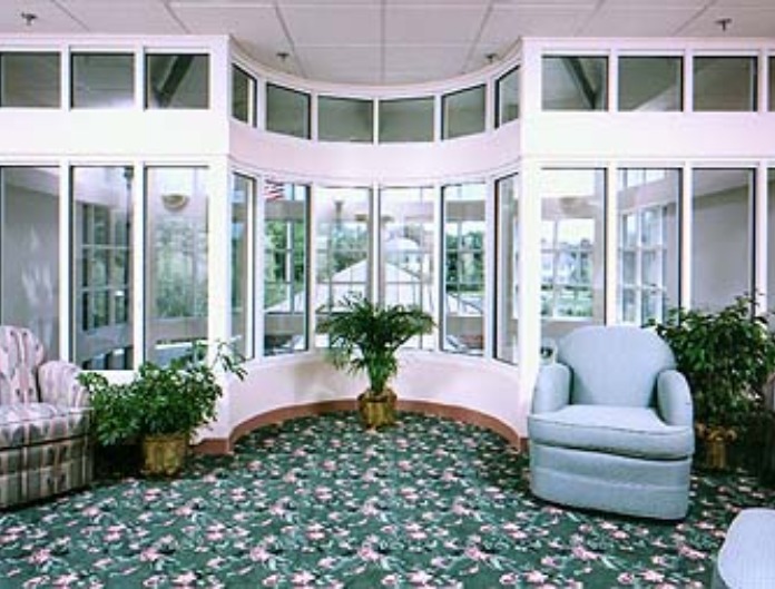 SECOND FLOOR FAMILY ROOM/ LOUNGE OVERLOOKING THE MAIN ENTRY LOBBY