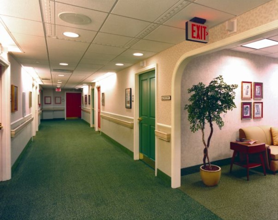 ROSS-WORTHEN ALZHEIMER'S UNIT RESIDENT CORRIDOR, LOUNGE ON RIGHT LEADING TO SENSORY GARDEN