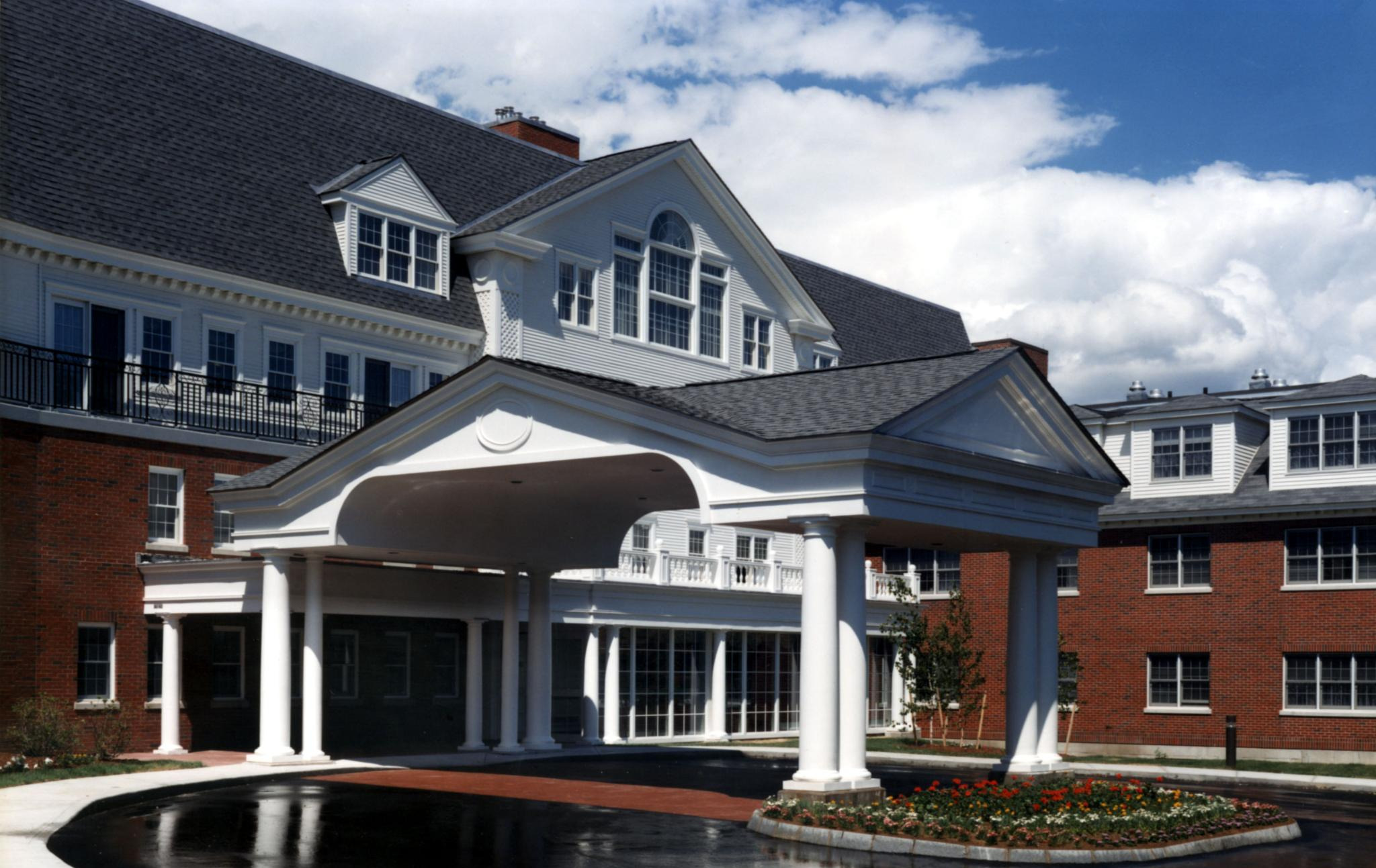 NEW FOUR STORY COMMUNITY BUILDING (NEW MARY HUNT RESIDENCE ON THE RIGHT)